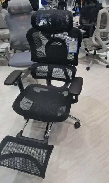 Multi-functional ergonomic chair